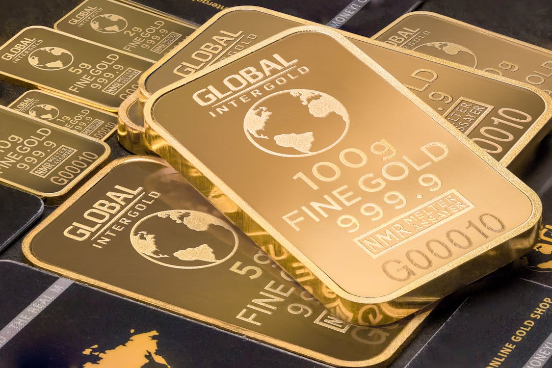 gold bars lying in a pile