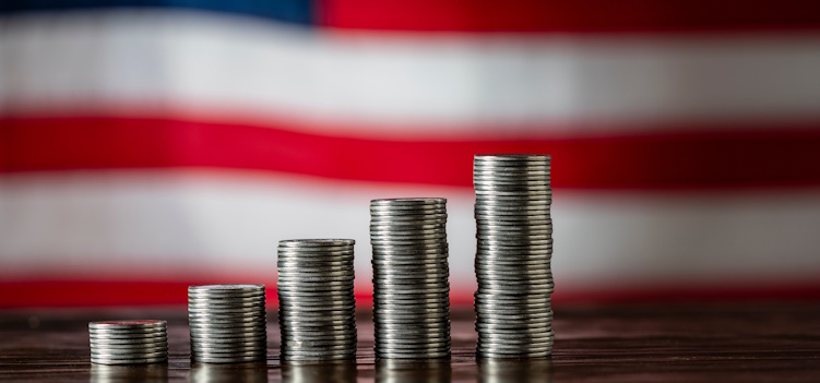 coins in front of american flag