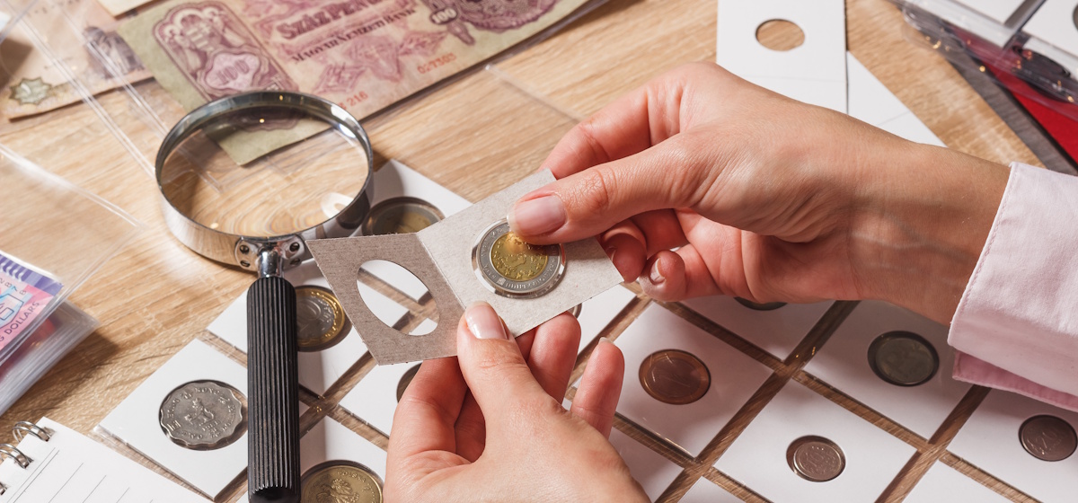coin dealer inspecting coins