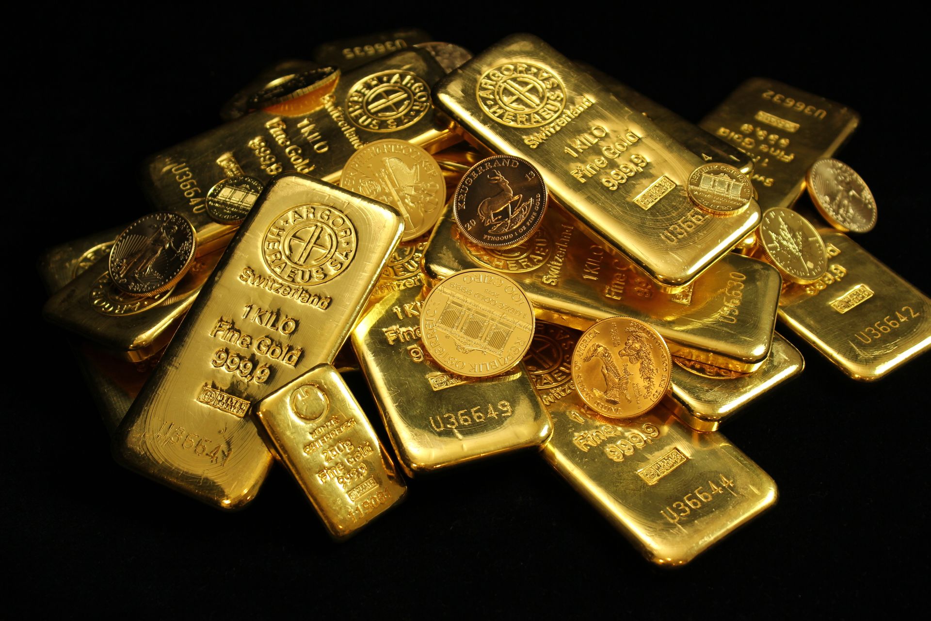 gold coins and bars stacked like a Federal Reserve vault