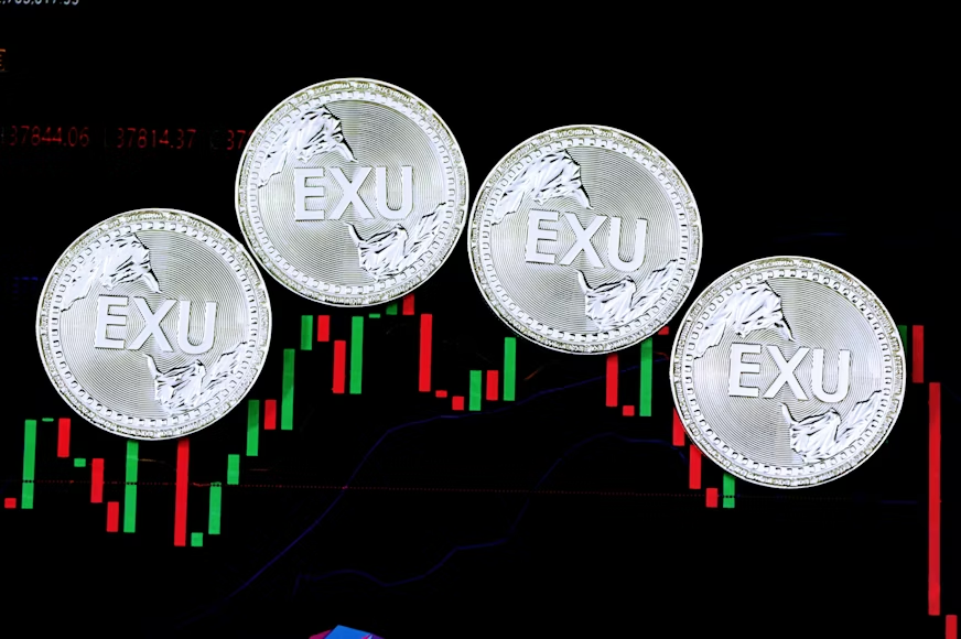 A price chart with silver coins on it