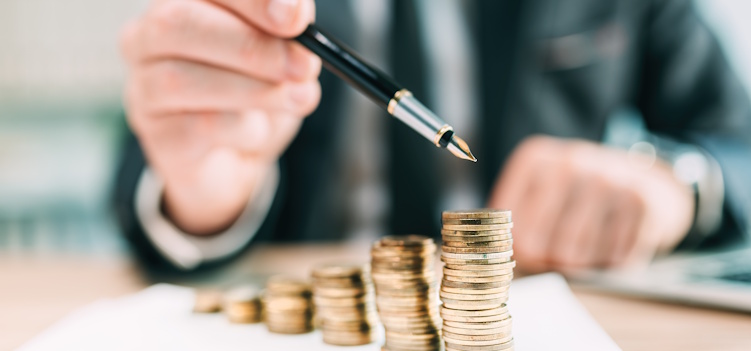 coin dealer with stack of coins