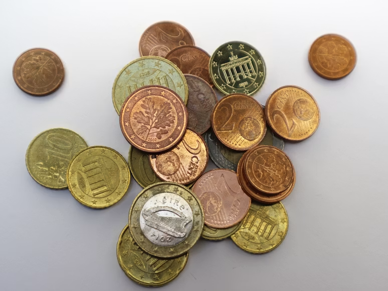 A collection of silver and gold coins