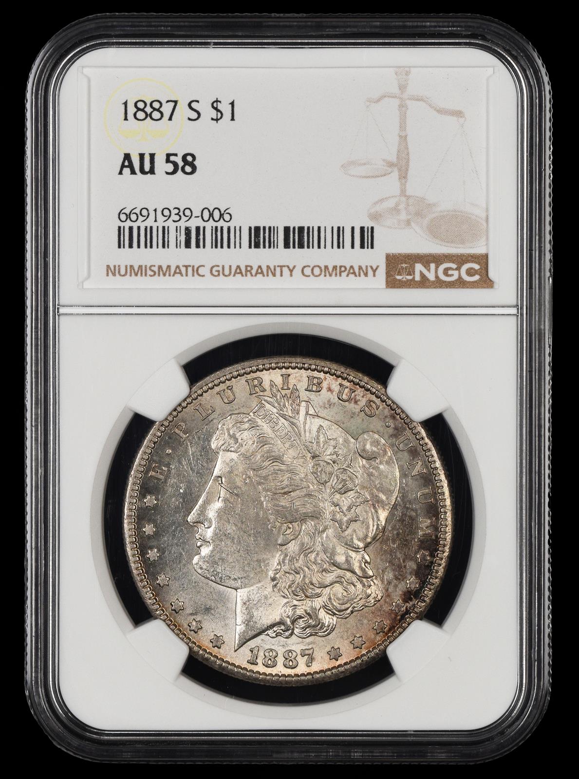 1887 S $1 NGC AU-58
