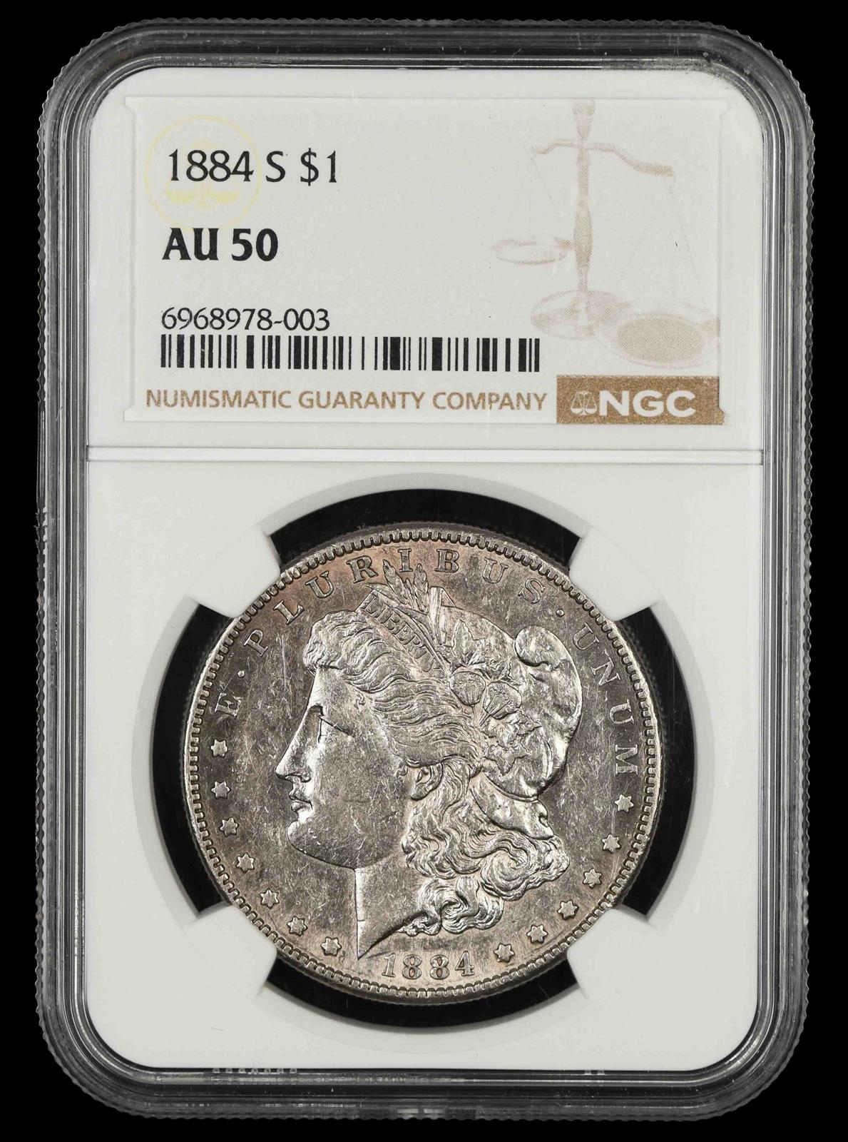 1884 S $1 NGC AU-50