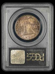 1958 50C Toned OGH PCGS MS 65 CAC