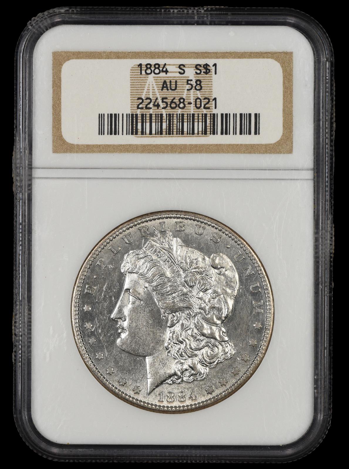 1884 S $1 NGC AU-58