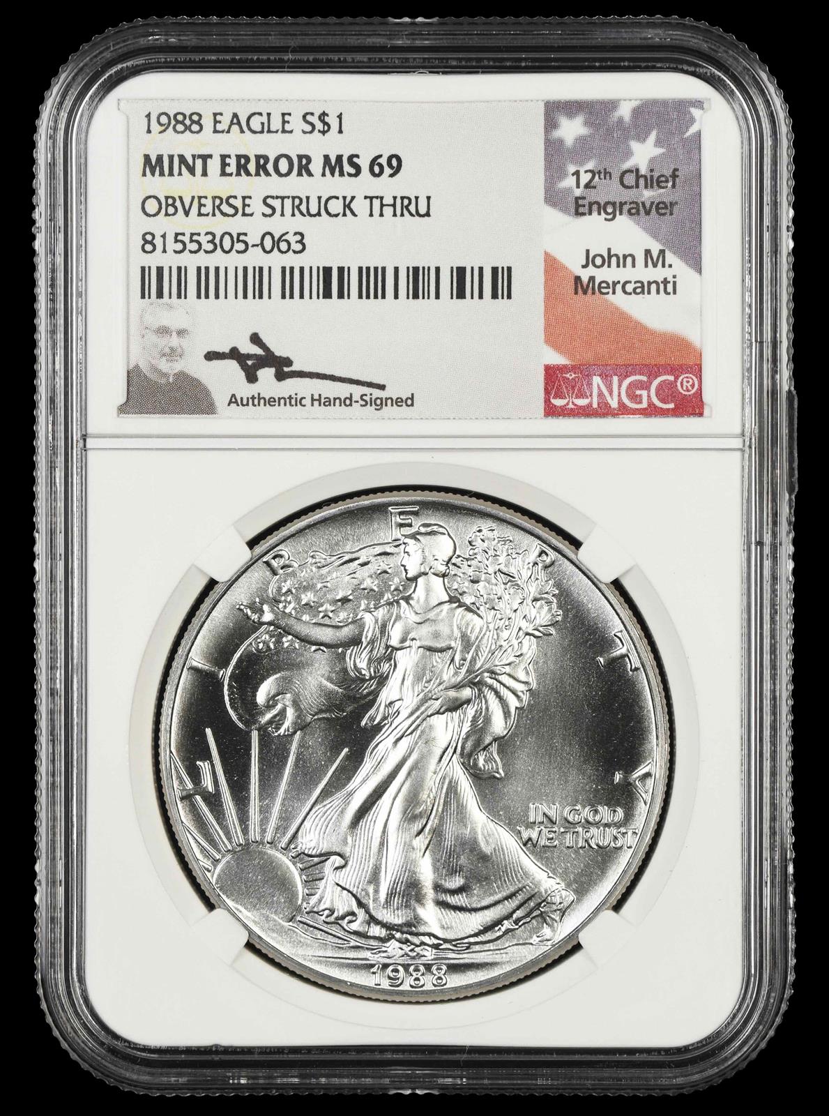1988 Eagle S$1 Mint Error Obverse Struck Thru John Mercanti Signature Label NGC MS 69