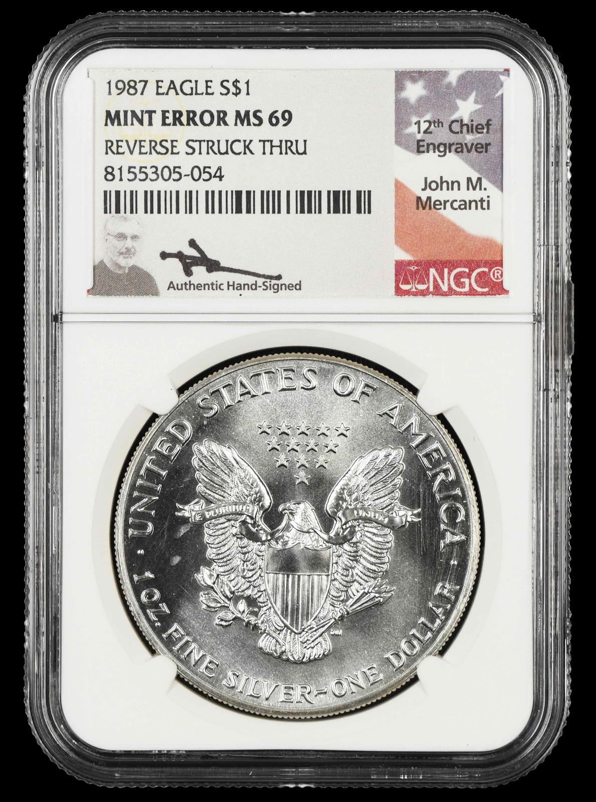 1987 Eagle S$1 Mint Error Reverse Struck Thru John Mercanti Signature Label NGC MS 69