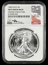 1988 Eagle S$1 Mint Error Obverse Struck Thru John Mercanti Signature Label NGC MS 69