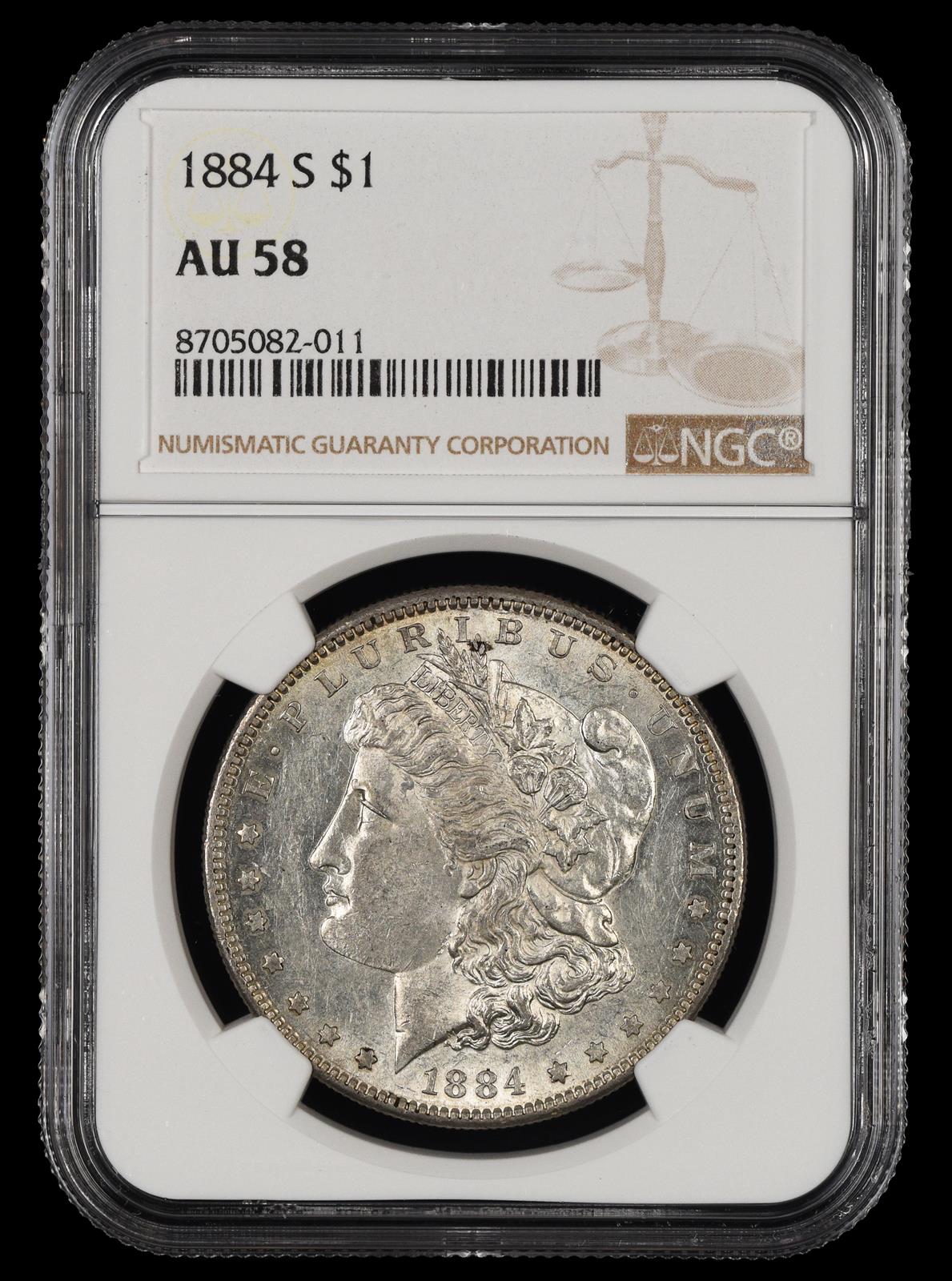 1884 S $1 NGC AU-58