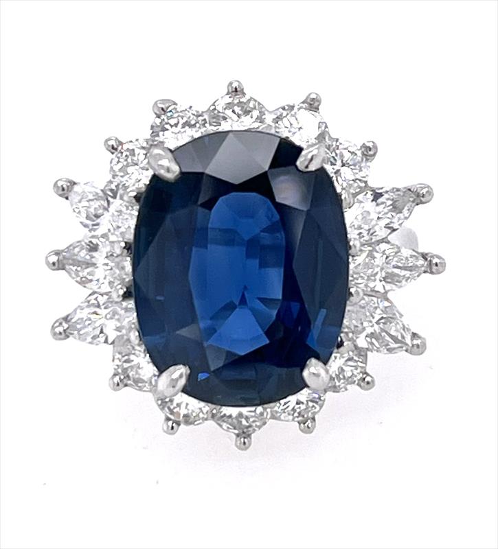 7.58ct GIA Natural Oval Brilliant Cut Blue Sapphire Ring with Diamond Halo, in Platinum Mounting 