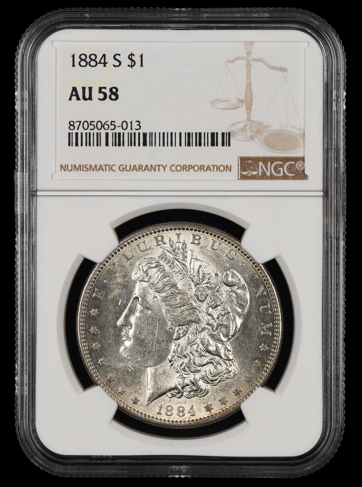 1884 S $1 NGC AU-58