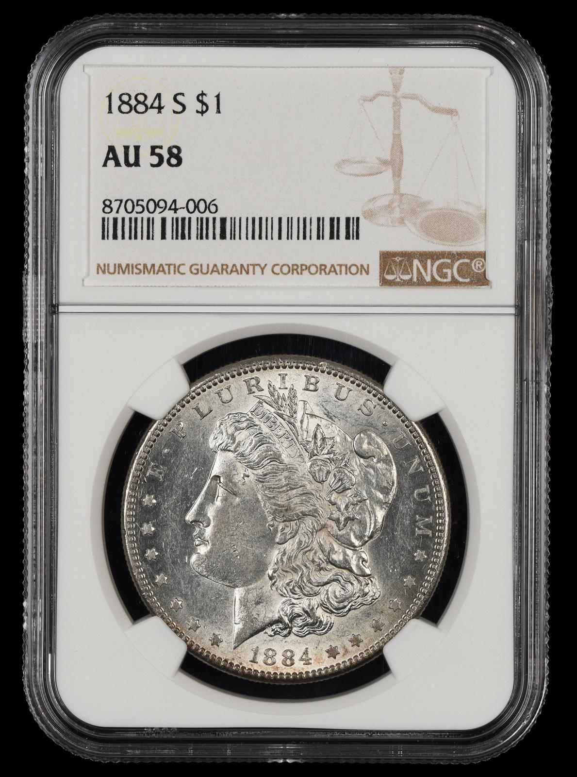 1884 S $1 NGC AU-58