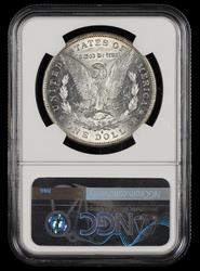 1884 S $1 NGC AU-58